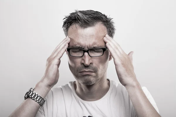 Man with headache — Stock Photo, Image