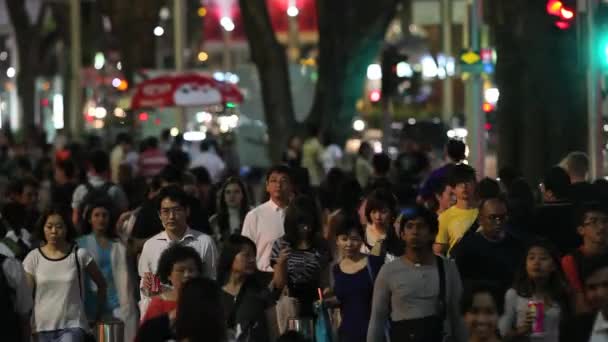 Multidão nocturna em Singapura — Vídeo de Stock