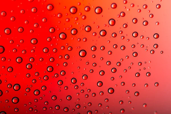 Gotas Agua Sobre Fondo Color Tono Rojo —  Fotos de Stock