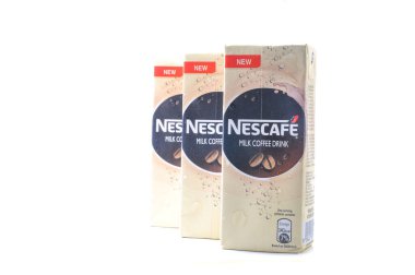 KUALA LUMPur, Malezya - 7 Şubat 2015. Nescafe Süt İçeceği paketleri. Nescafe, Nestle tarafından üretilen bir hazır kahve markasıdır. Adı 