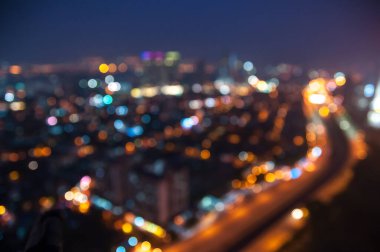  Bokeh ışığı ve bulanık modern şehir silüeti arkaplanı.