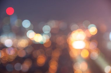  Bokeh ışığı ve bulanık modern şehir silüeti arkaplanı.