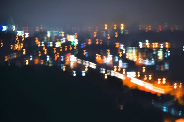  Bokeh ışığı ve bulanık modern şehir silüeti arkaplanı.