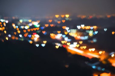  Bokeh ışığı ve bulanık modern şehir silüeti arkaplanı.