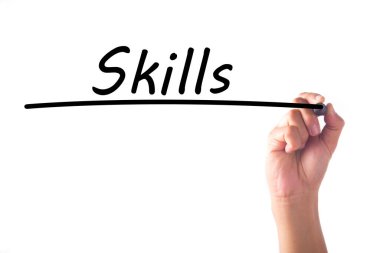 Şeffaf tahta üzerinde el yazması SKILLS kelimesi
