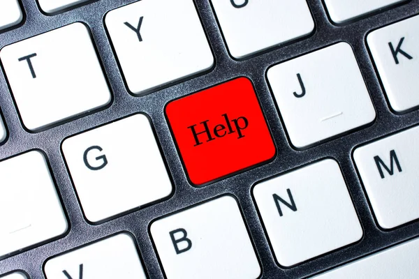 Beyaz bilgisayar klavyesinde yardım düğmesi