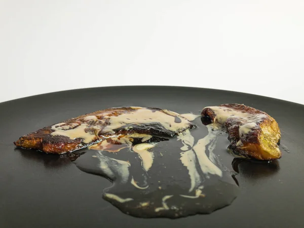 Üzerine tahini ve keçiboynuzu özü ile kavrulmuş bal kabağı.