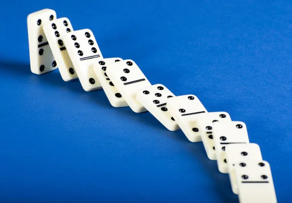 Domino effect with black and white tiles — Stock Photo, Image