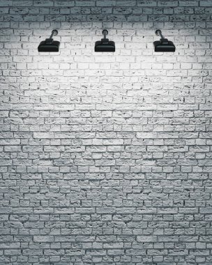 Üç ışıklandırmalı beyaz tuğla duvar. 3d oluşturma