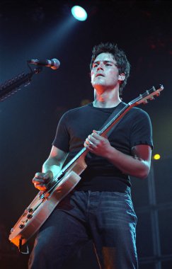 DENVER	MAY 14:		Guitarist Ryan Peake of the Heavy Metal band Nickelback performs in concert May 14, 2002 at the The Fillmore in Denver, CO.