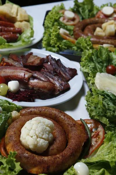 Brazilian feijoada meal Linguica pork knee — Stock Photo, Image
