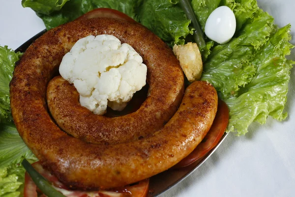 Portion of pork sausage to serve — Stock Photo, Image