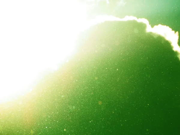 Fond vert abstrait avec poussière flottante — Photo