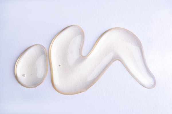 Cosmetic gel product on white background. Texture and background