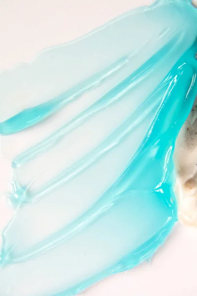 Producto cosmético de gel líquido con partículas brillantes —  Fotos de Stock