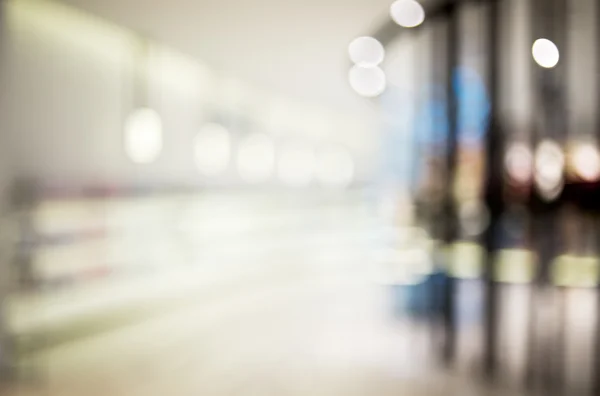 Super Blurred of cosmetics store with bokeh background