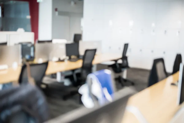 Abstract office blur background with wooden desk, chair with lap — Stock Photo, Image