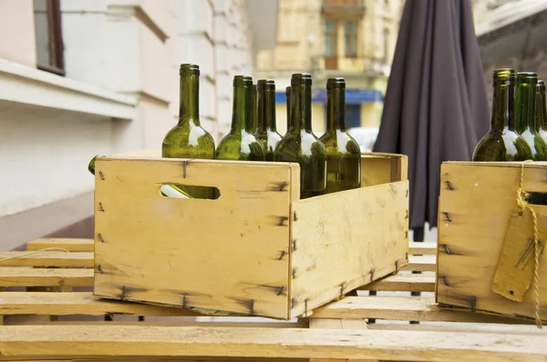 empty bottles of wine in boxes