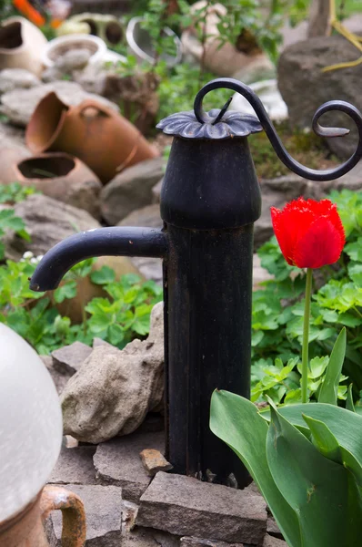 Old vintage water pump in the garden — Stock Photo, Image