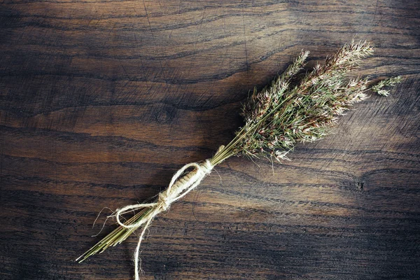 Fresh bouquet of Herbs on the wooden table