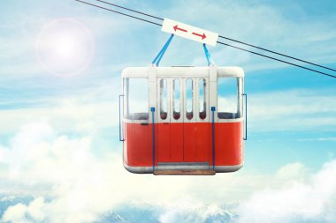 Cable car raising the top of the mountain paradise direction clipart