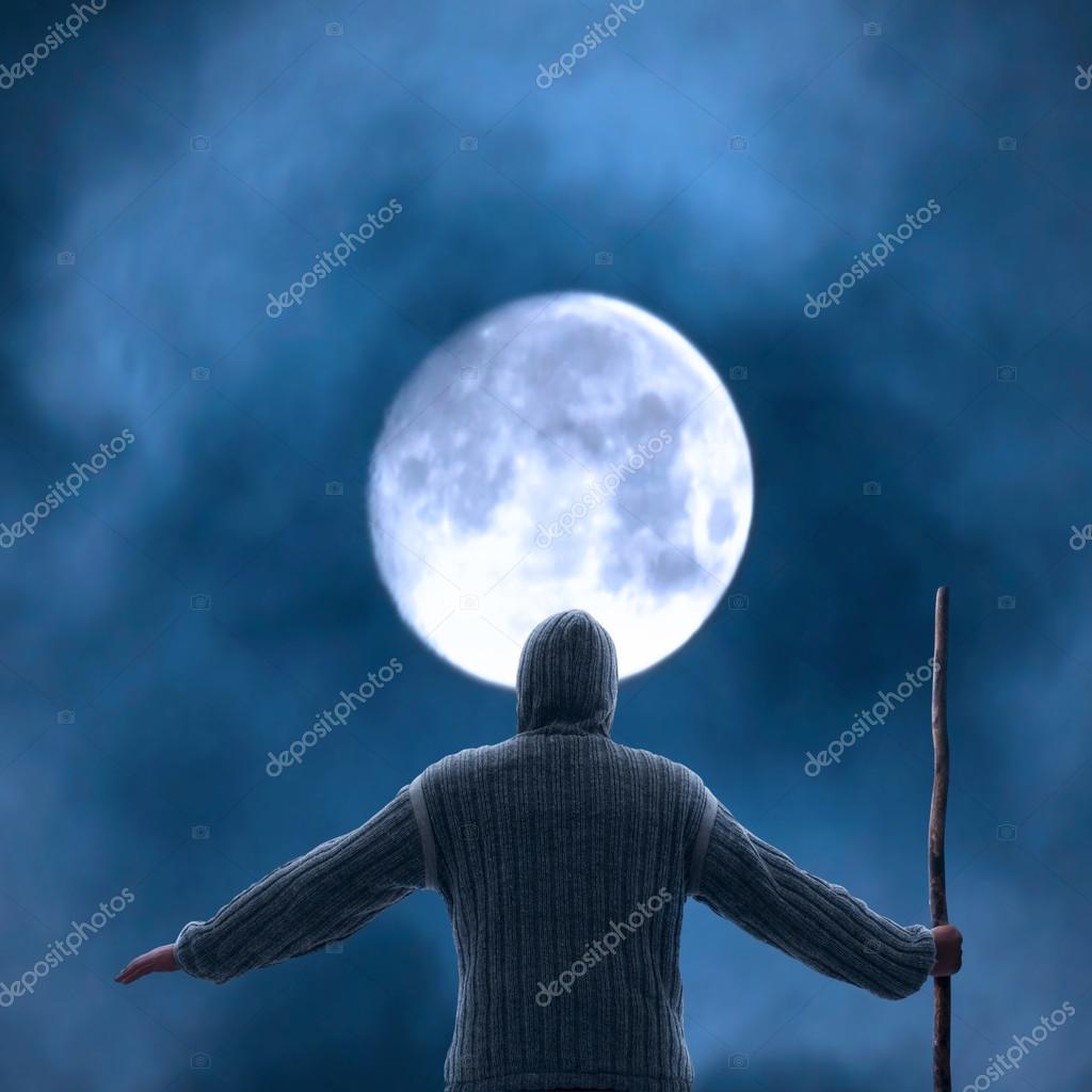 Hombre iluminado mirando la luna: fotografía de stock © frankie_s #76852249