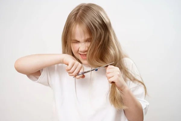 Little Girl Shears Her Long Hair Scissors White Background Fashionable — Stock Photo, Image