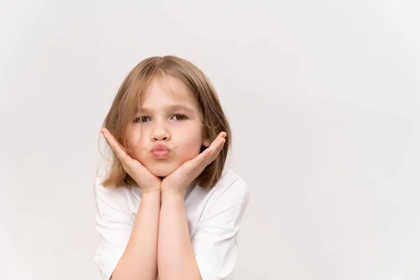 Cheerful Happy Little Girl Haircut Quad Holds Hands Face White — Stock Photo, Image