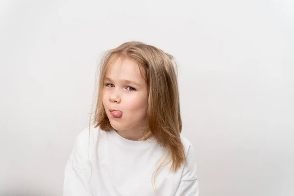 Funny Little Girl Shows Tongue White Background Happy Childhood Vitamins — Stock Photo, Image