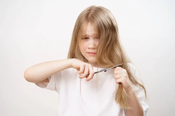 Sad Little Girl Shears Long Hair Scissors Afraid White Background — Stock Photo, Image