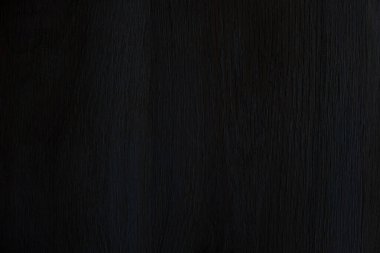 Koyu bir ahşap doku.