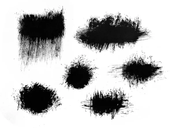 Petele de cerneală sunt izolate pe un fundal alb. Grunge stropi murdărie, pată, spray, stropi cu picături pete . — Fotografie, imagine de stoc