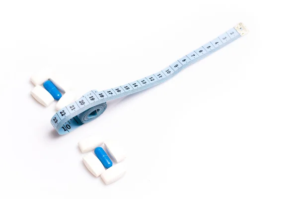 Medical pills and centimeter, for weight loss or increase penis size — Stockfoto