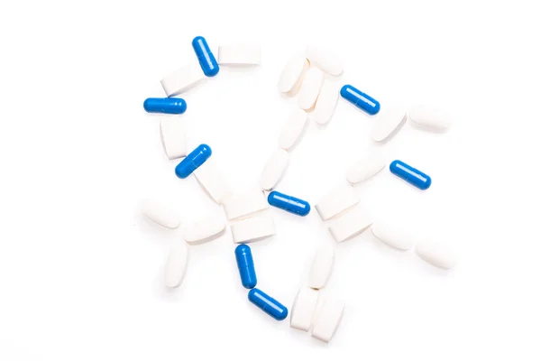 흰색과 파란색 흰색 배경에 질병 치료를 위한 의료 약 — 스톡 사진