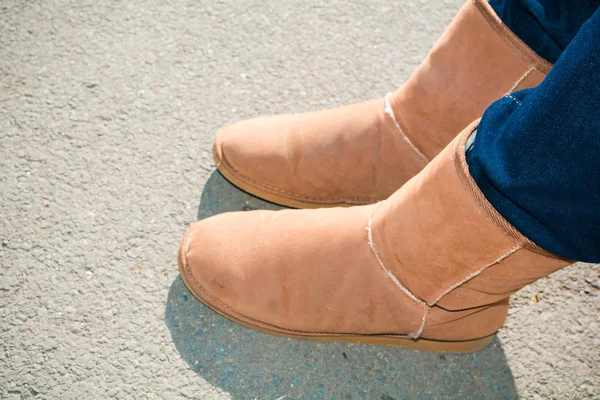 A pair of winter boots leg of girl — Stock Photo, Image