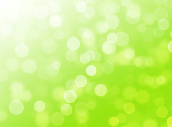 Bílá zelená žlutá bokeh na zeleném pozadí — Stock fotografie