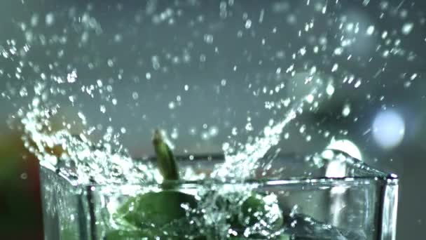 Bell pepper falling into glass — Stock Video