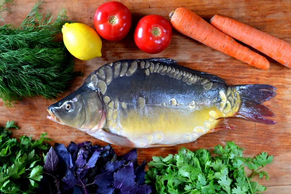 Fish with fresh vegetables and herbs