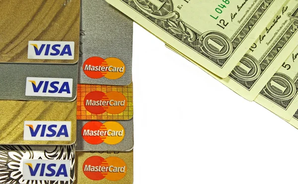 Cartões de crédito e dólares — Fotografia de Stock