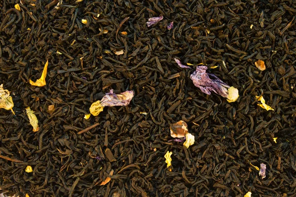 Arka plan siyah çay katkı maddeleri ile — Stok fotoğraf