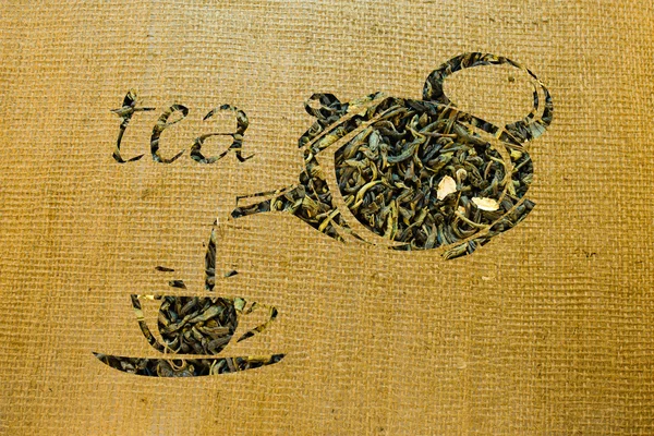 Czajnik i filiżanki wykonana z zielonej herbaty na zwolnieniu — Zdjęcie stockowe
