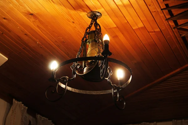 Antique chandelier with three candles — Stock Photo, Image