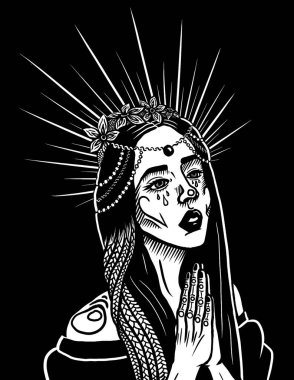 Kız dua ediyor ve ağlıyor.