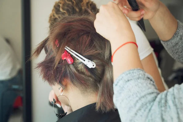 Creating hairstyles for girls — Stock Photo, Image