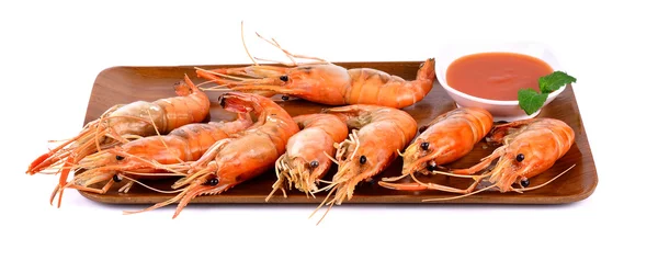 Shrimps with mint leaves on the wooden board — Stock Photo, Image