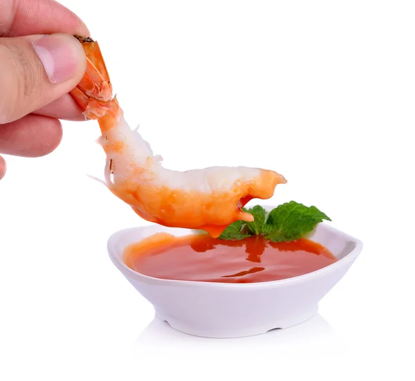 Hand Holds Shrimp with Chili Sauce isolated on white background — Stock Photo, Image