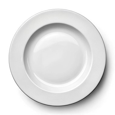 Beyaz bir yemek tabağının yakın çekim görüntüsü. Kenarında dokulu eşmerkezli halkalar olan basit bir tasarım içeriyor.