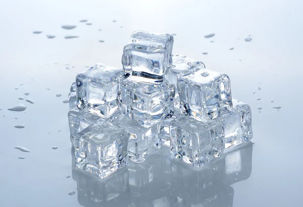 Square ice cubes on white background