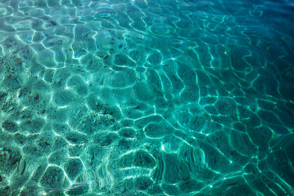the bottom of the sea with crystal clear water