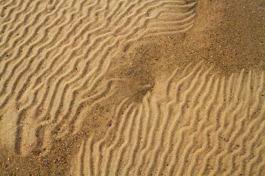Dalgalı kumlu dokuya yakın çekim